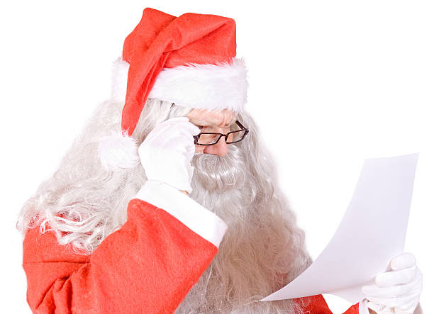 istock Santa Claus reads the letter 134110315