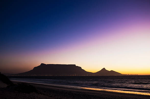 istock Table Mountain silhouetted against the dying daylight 134110472