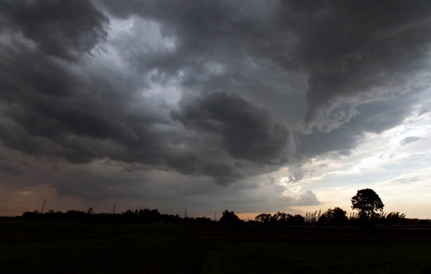istock Storm clouds with the rain. Nature Environment Dark huge cloud sky black stormy cloud 1341108793