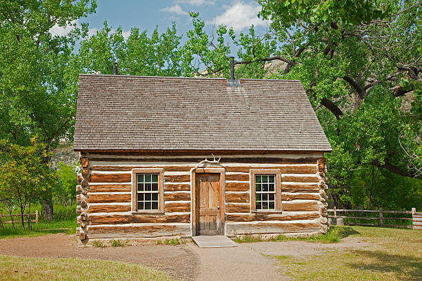 Teddy Roosevelt's Maltese Cross log cabin built from hand-hewn timbers and chinked with mortar.