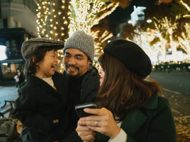 Happy family having fun in the city during holidays. stock photo
