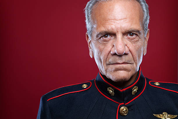 Retired Marine Portrait Gray haired man in a Marine dress blues uniform us marine corps stock pictures, royalty-free photos & images