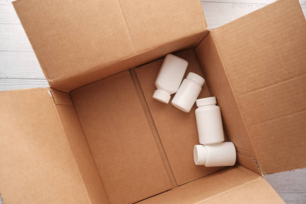istock medical pill containers in open a box 1341118010