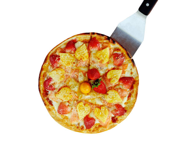 Delicious pizza with ham and mixed fruits