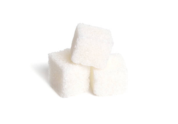 istock Heap of Sugar cubes isolated on white background 1341119064