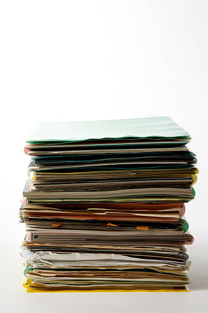 istock Isolated shot of stacked files on white background 134111990
