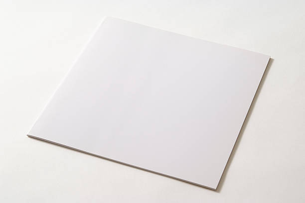 istock Isolated shot of thin square blank book on white background 134111995
