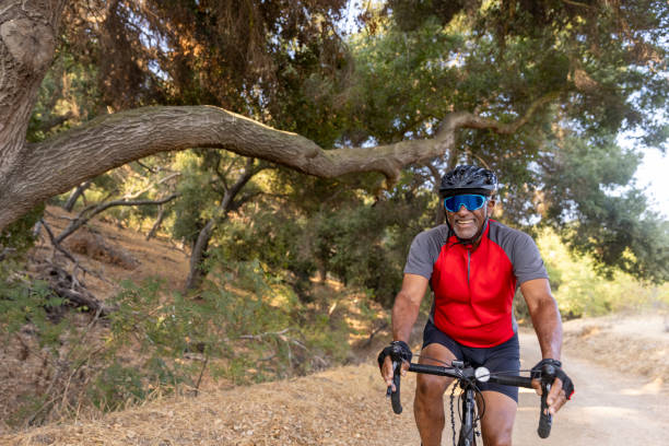 istock Senior Black Man Cycling 1341120382