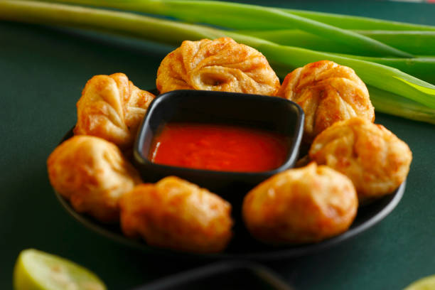 Fried momos dumpling Fried momos dumpling chinese dumpling stock pictures, royalty-free photos & images