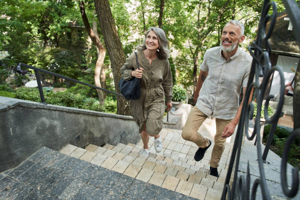 istock Happy mature couple resting on the nature 1341129787