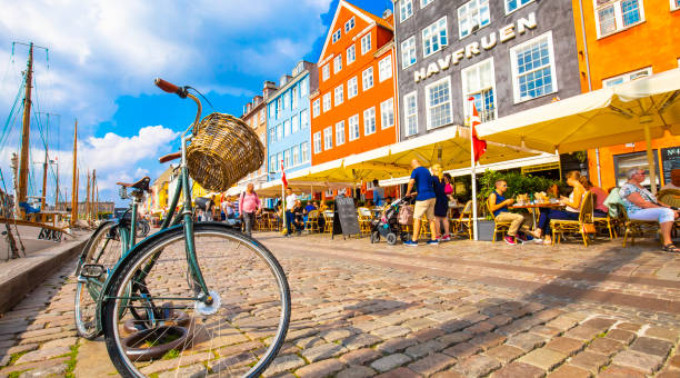 Nyhavn harbour and Kopenhagen old town, Denmark Copenhagen, Denmark - June 19, 2021: Nyhavn harbour and Copenhagen old town panoramic view nyhavn stock pictures, royalty-free photos & images