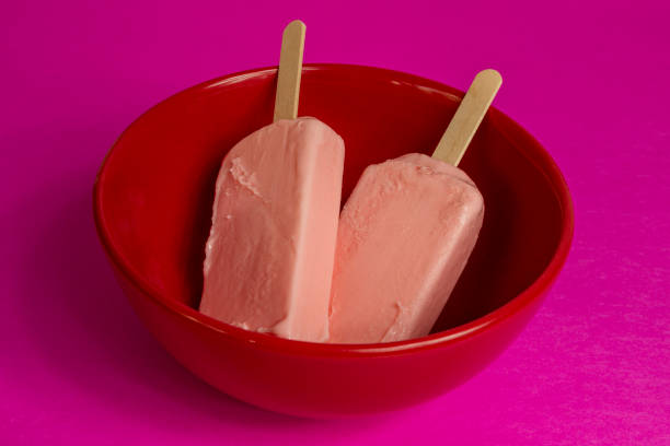 istock popsicle of black berries on red bowl 1341130601