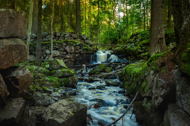 istock Creek passing an old iron works in Sweden 1341132486