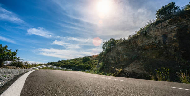 istock Mediterranean sea coast road into mountains horizon in summer 1341134576