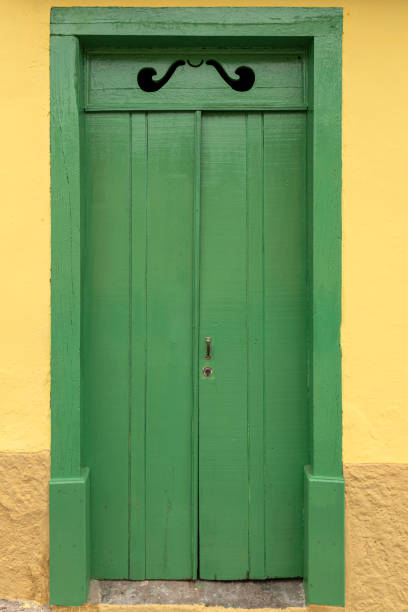 Old door on facade of colonial house in Santana do Parnaiba, historic city of colonial period of Brazil. Founded in 1580 It is official historical heritage.