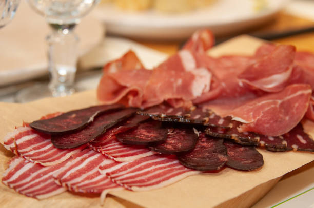 istock Set of meat cold cuts on wooden table 1341139367
