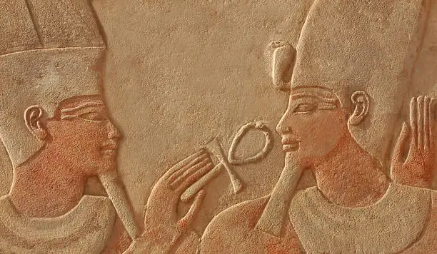 The god amun makes the gift of life (ankh) to the pharaoh Thutmoses IV.