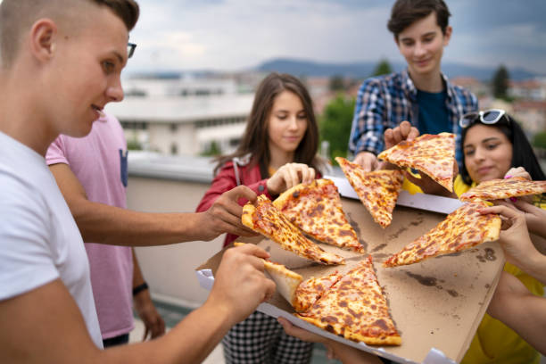 istock Pizza time with friends 1341144429