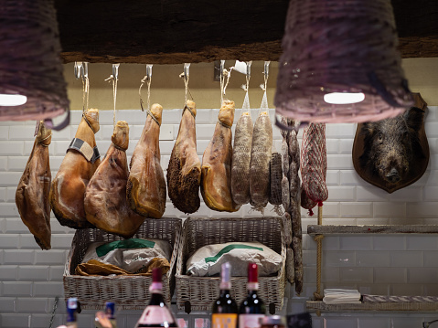 Ham Assortment and Sausages in Italian Butcher Shop.