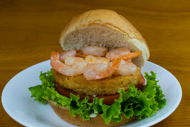 istock salmon burger with sauteed shrimp 1341148190