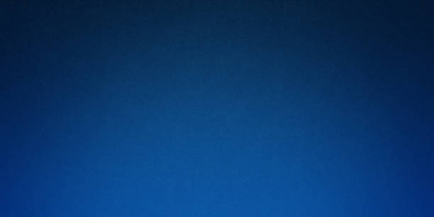 istock Texture of old navy grunge blue paper closeup background 1341155080