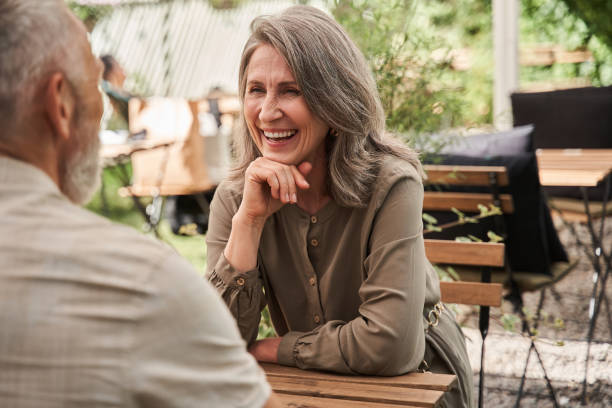 istock Woman laughing out loud with her beloved husband while discussing something 1341157141