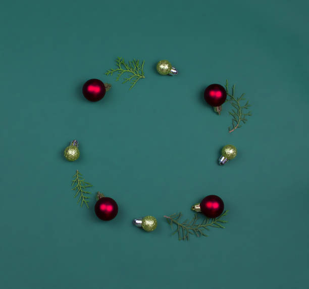 istock Christmas composition. Christmas wreath on a green background. Flat lounger, top view, copy space 1341157515