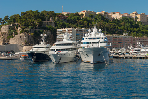 Monaco, Monaco - July 08 2008: View over luxury yachts moored in Monaco harbor.
