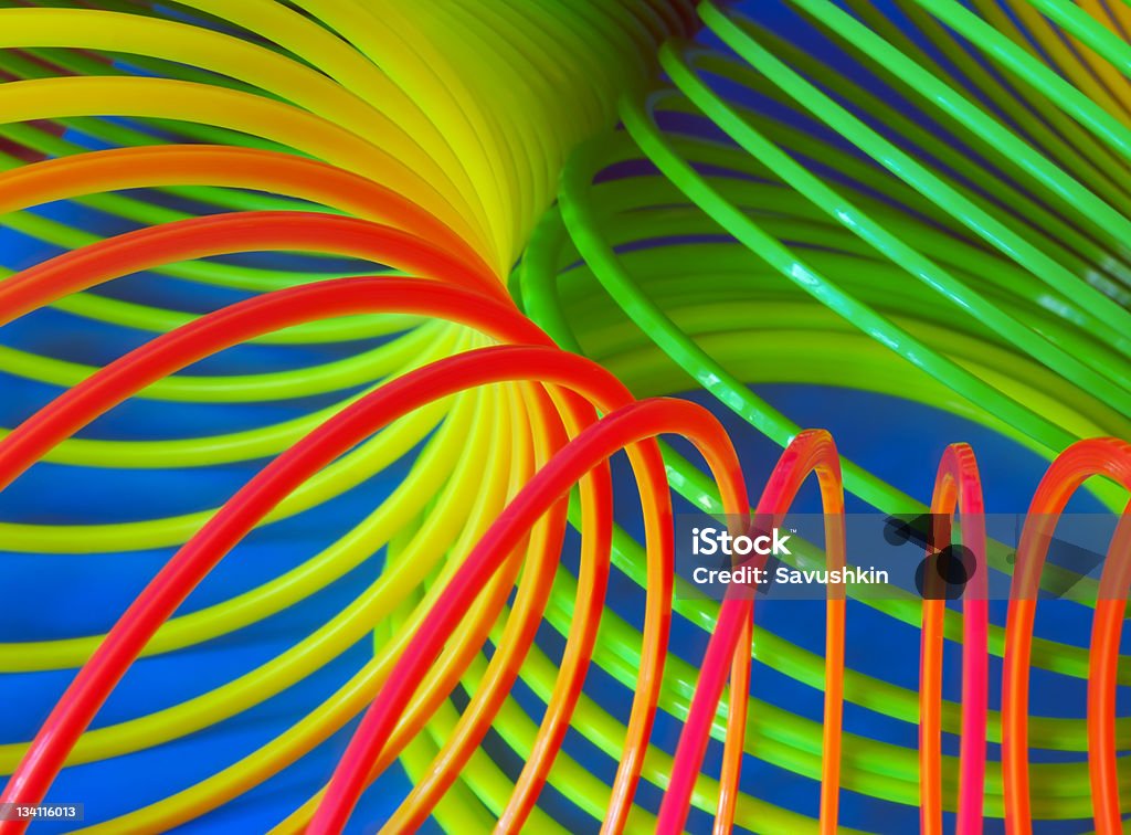 Slinky toy Spring toy, close-up Metal Coil Toy Stock Photo