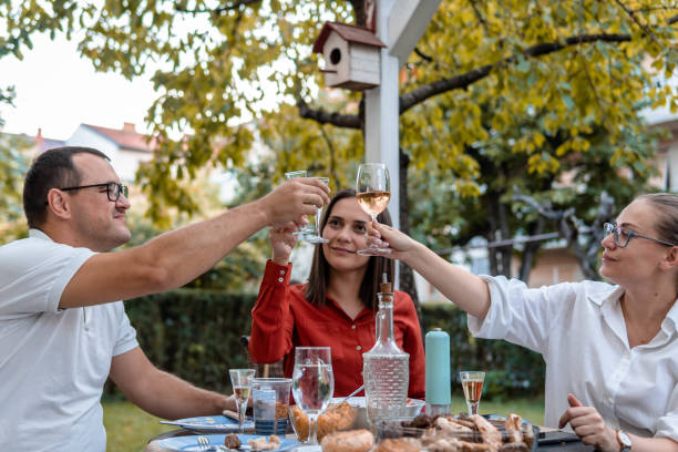 istock Friends Celebrating Together 1341160651