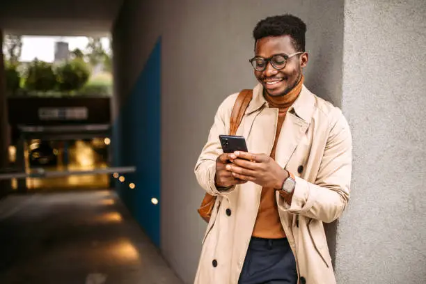 Photo of Businessman waiting for a ride to the work