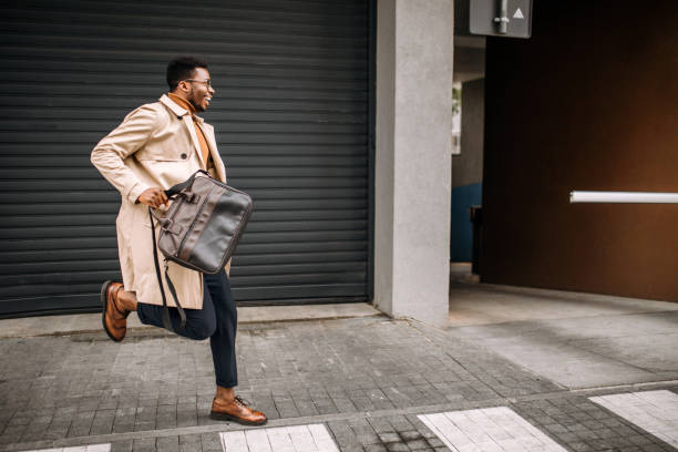istock Businessman running on his way to the office. 1341161139
