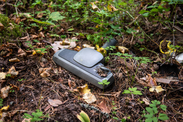 istock Random garbage junk items left in nature and forests. Vacuum cleaner part 1341161148