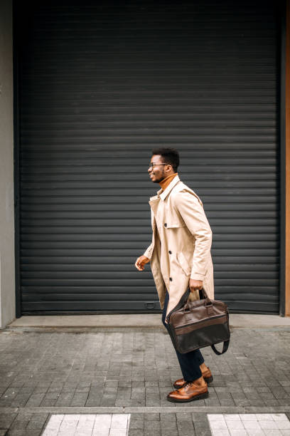 istock Businessman running on his way to the office. 1341161181