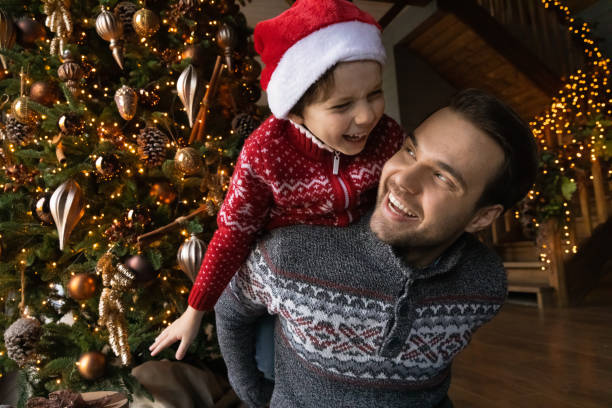 istock Emotional young father playing with laughing small son. 1341162348