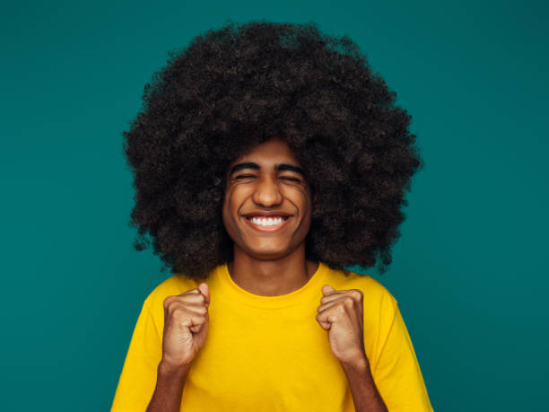 istock Portrait of funny afro guy 1341162433
