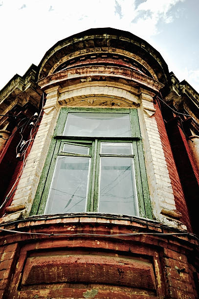 istock Corner of the old house with a window 134116326