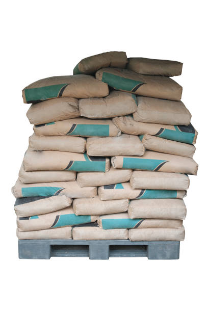 istock Cement powder bags stacked isolated on white background 1341164332