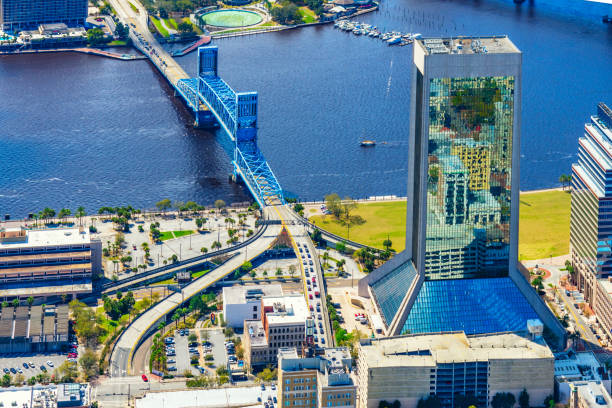 Aerial view of the beautiful skyline of Jacksonville Florida along the St. Johns River from an altitude of about 1000 feet over the city.