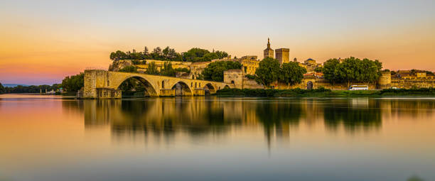 The sunset view of Avignon, a city in Provence region of France The sunset view of Avignon, a city in southeastern France's Provence region avignon france stock pictures, royalty-free photos & images