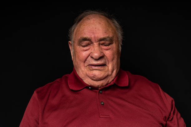 Studio portrait of an old Portuguese man.