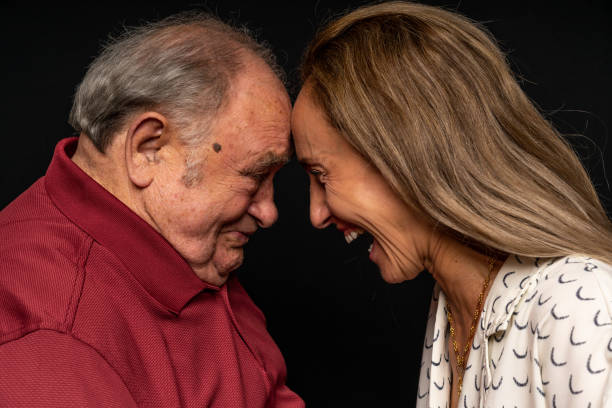 retrato de una hija y su padre. - senior adult aging process old backdrop fotografías e imágenes de stock