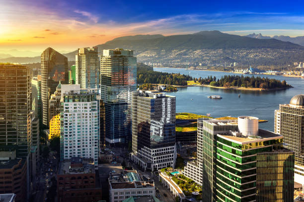 Aerial view of  Vancouver business district Panoramic aerial view of  Vancouver business district at sunset, Canada moody sky stock pictures, royalty-free photos & images