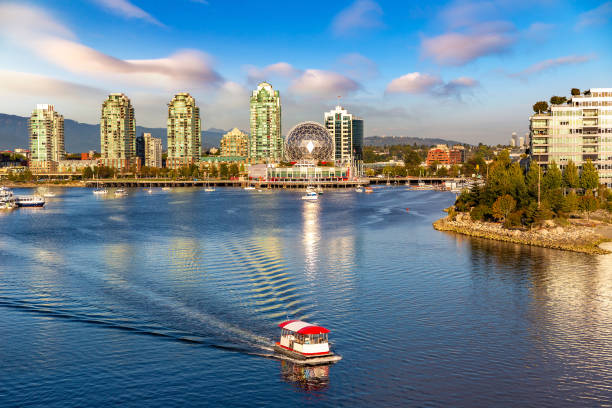 False creek in Vancouver, Canada Panoramic aerial view of  Vancouver and false creek at sunset in Vancouver, Canada false creek stock pictures, royalty-free photos & images