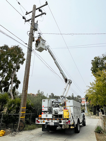 Restoring power to residential area, Malibu, Ca