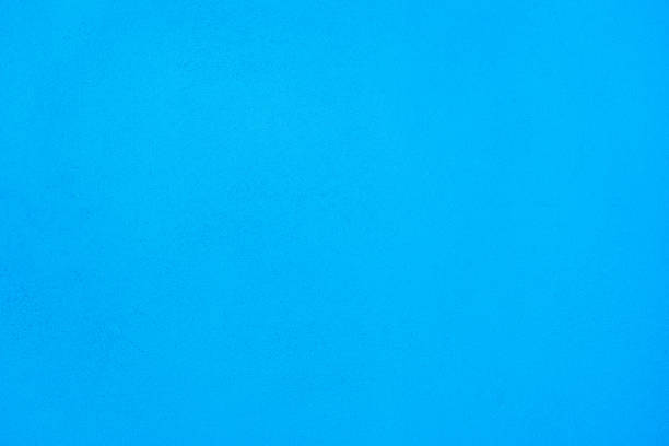 istock Light Blue color cement wall for texture and background 1341176220