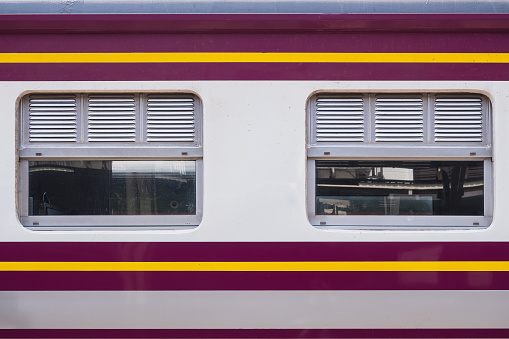 Side view of the window of the antique train