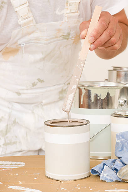 istock Home decorating mixing up paint color can 134118133
