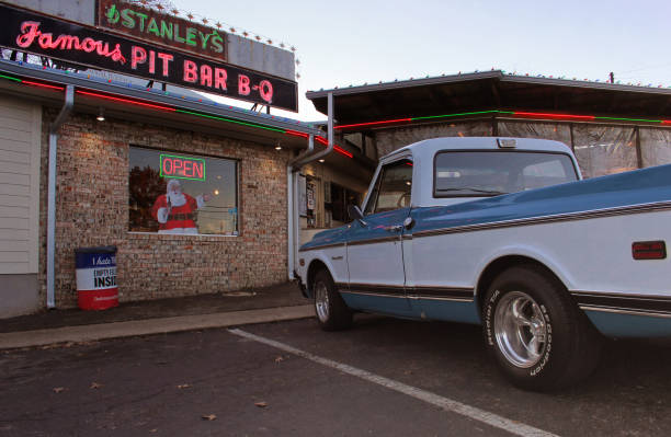 Tyler, Texas - December 9, 2017: A truck parked outside Stanley's Famous Pit Bar-B-Q in Tyler Texas Tyler, Texas - December 9, 2017: A truck parked outside Stanley's Famous Pit Bar-B-Q in Tyler Tx tyler texas photos stock pictures, royalty-free photos & images