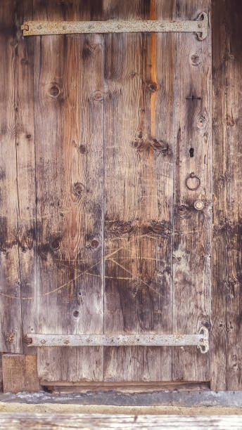 istock a historical Turkish wooden door with rusty decorations 1341181866